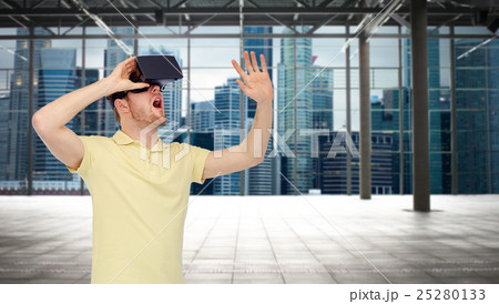 happy man in virtual reality headset or 3d glasses happy man in virtual reality headset or 3d glasses 25280133