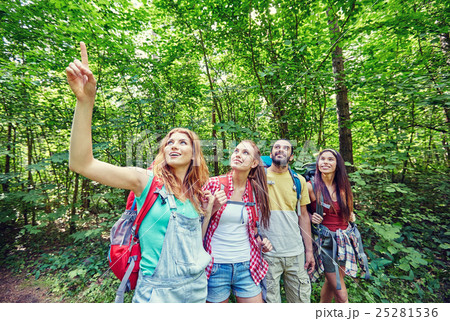 group of smiling friends with backpacks hiking group of smiling friends with backpacks hiking 25281536