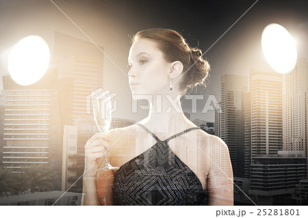 young asian woman drinking champagne at party 25281801