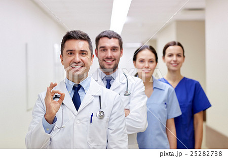 group of happy medics or doctors at hospital 25282738