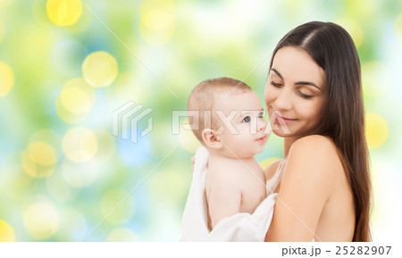 happy mother holding adorable baby 25282907