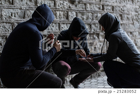 close up of people smoking cigarettes with drugs 25283052