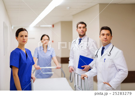 group of doctors with gurney at hospital 25283279