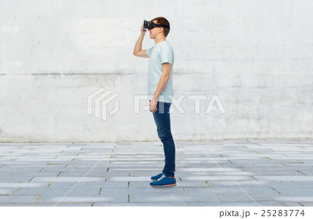 happy man in virtual reality headset or 3d glasses happy man in virtual reality headset or 3d glasses 25283774