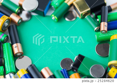 close up of green alkaline batteries 25284620