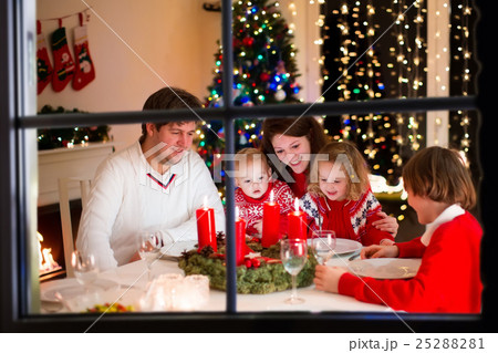 Family at Christmas dinner at home Family at Christmas dinner at home 25288281