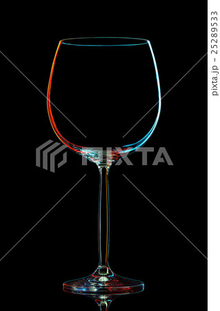Silhouette of colorful wine glass on black 25289533