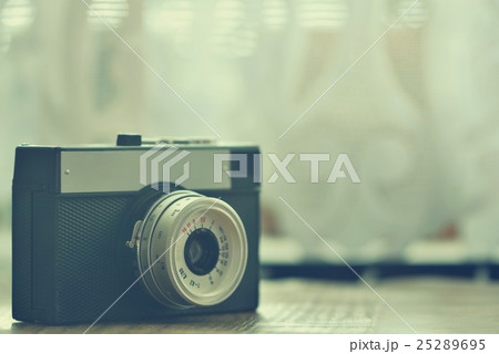 Russian old analog camera. Old retro photo. 25289695