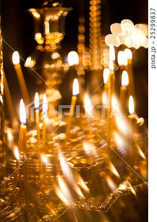 burning Church candles burning Church candles 25299837