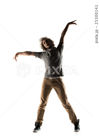 Modern style dancer posing on studio background 25300141