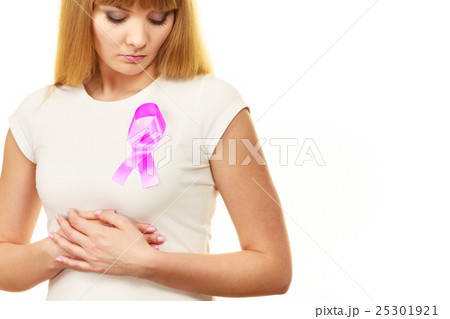 Woman sad girl wih pink cancer ribbon on chest Woman sad girl wih pink cancer ribbon on chest 25301921