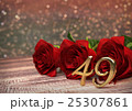 birthday concept with red roses on wooden desk 25307861