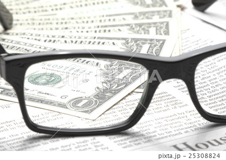 detail of dollars on business newspaper 25308824