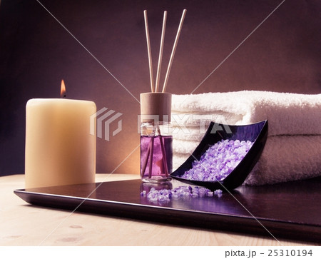 Spa massage border background with towel stacked, perfume diffuser and sea salt Spa massage border background with towel stacked, perfume diffuser and sea salt 25310194