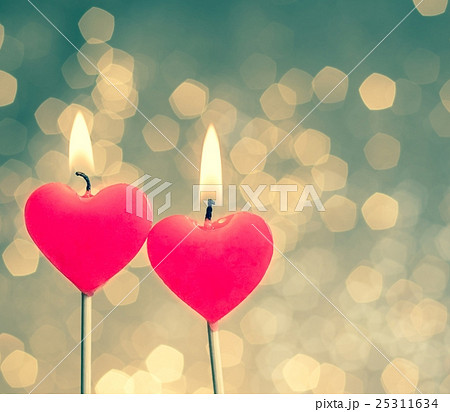 hearts candles on vintage bokeh as background vintage style hearts candles on vintage bokeh as background vintage style 25311634