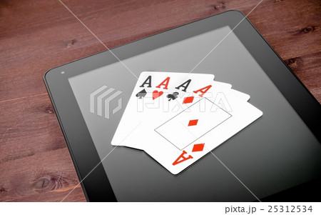 poker cards on digital tablet pc, concept of texas poker online poker cards on digital tablet pc, concept of texas poker online 25312534