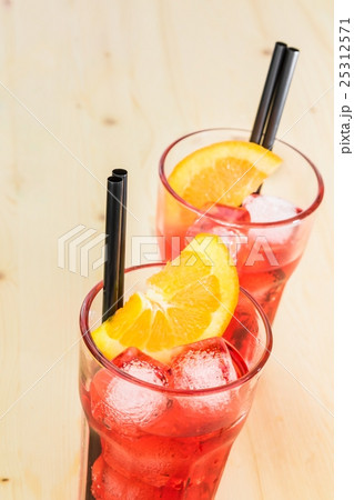 glasses of spritz aperitif aperol cocktail with orange slices and ice cubes 25312571