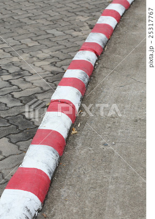 red and white marking sign on road red and white marking sign on road 25317767