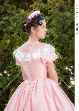 Romantic girl in evening dress. 25318328