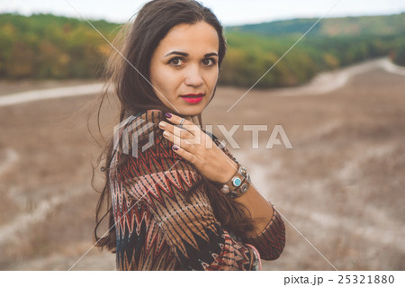 Woman is wearing clothes in boho style Woman is wearing clothes in boho style 25321880