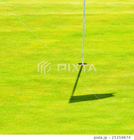 Nice golf course on a sunny summer day. Hole. 25359674