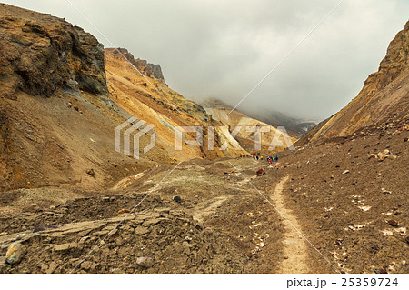 Climbing to active volcano Mutnovsky on Kamchatka. Climbing to active volcano Mutnovsky on Kamchatka. 25359724