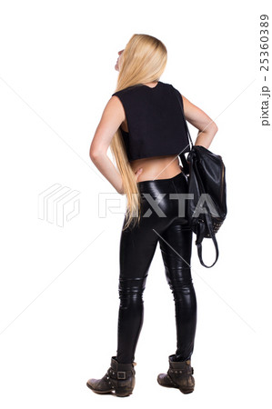 back view of standing young beautiful woman. back view of standing young beautiful woman. 25360389