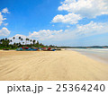 Empty clean beach with palms and fishing boats 25364240