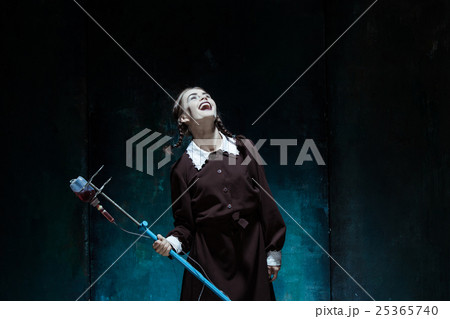 Portrait of a young girl in school uniform as a Portrait of a young girl in school uniform as a 25365740