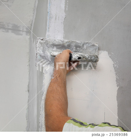 Electrician install electrical plug Electrician install electrical plug 25369386