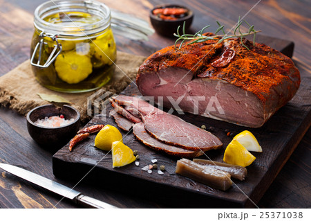 Beef pastrami sliced, roasted beef, slow cooking. 25371038