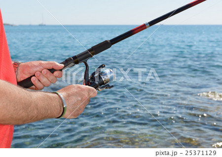Fishing Rod and Fisherman Fishing Rod and Fisherman 25371129