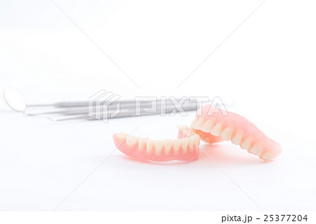 Set of denture and dental mirror, smile jaws teeth 25377204