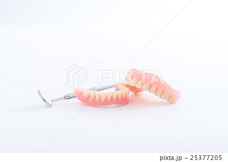 Set of denture and dental mirror, smile jaws teeth 25377205