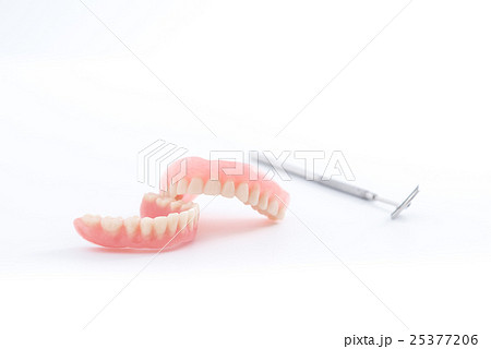 Set of denture and dental mirror, smile jaws teeth 25377206