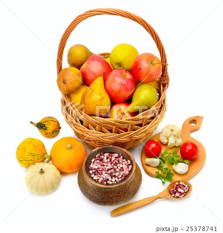fruits in a basket isolated on white background 25378741