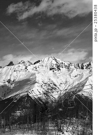 Black and white ski lift in snow mountain winter 25380438