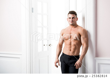 Portrait of a well built shirtless muscular male 25382814