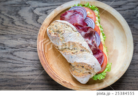 Sandwich with ham, cheese and fresh vegetables 25384555