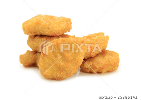 Fried chicken nuggets on white background. 25386143