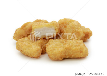 Fried chicken nuggets on white background. 25386145