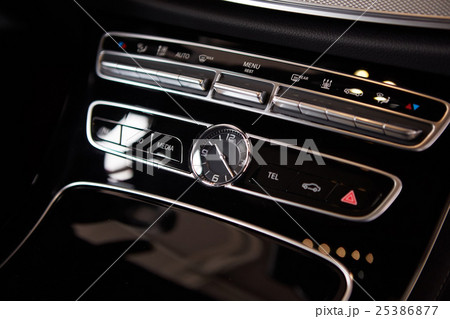 Luxury car interior details. Middle console with Luxury car interior details. Middle console with 25386877