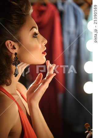 Beautiful female model with wonderful make-up Beautiful female model with wonderful make-up 25390569