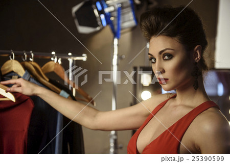 Confident young woman wearing fashionable clothing 25390599