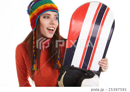 Young woman standing with snowboard isolated on white Young woman standing with snowboard isolated on white 25397591
