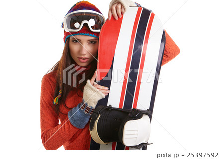 Young woman standing with snowboard isolated on white Young woman standing with snowboard isolated on white 25397592