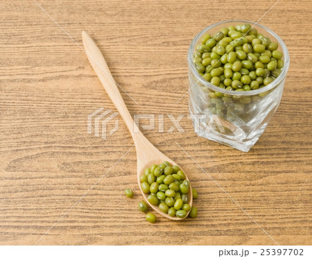 Mung Beans in A Spoon and Glass Cup 25397702