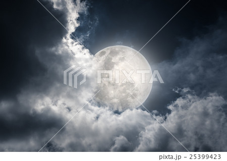 Nighttime sky with cloudy and bright moon.  25399423