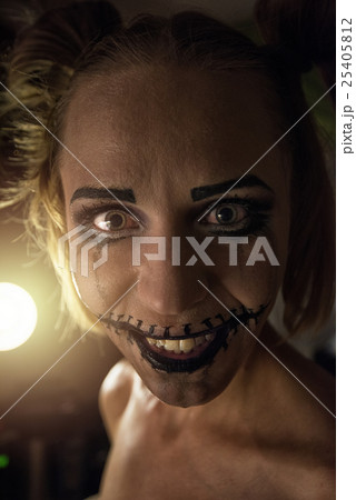 Horrible girl with scary mouth and eyes 25405812
