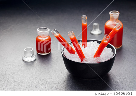 Bloody cocktail in glass tubes for Halloween Bloody cocktail in glass tubes for Halloween 25406951